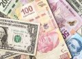 Peso se debilita frente al dólar, alcanza 18.45 unidades